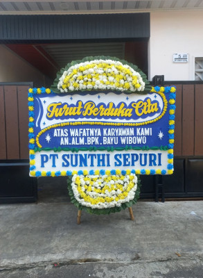 Papan Bunga Duka di Pasar Belakang