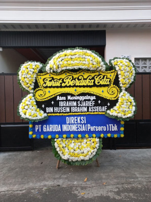 Papan Bunga Duka di Pasar Belakang
