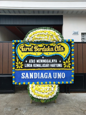 Papan Bunga Duka di Pasar Belakang