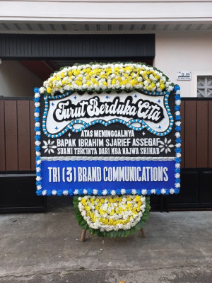 Papan Bunga Duka di Pasar Belakang